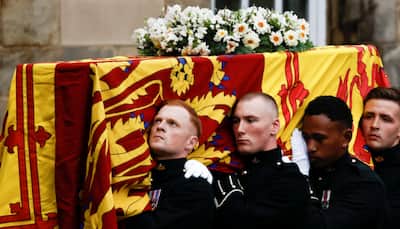 Queen Elizabeth II’s coffin reaches Edinburgh; crowd tearful