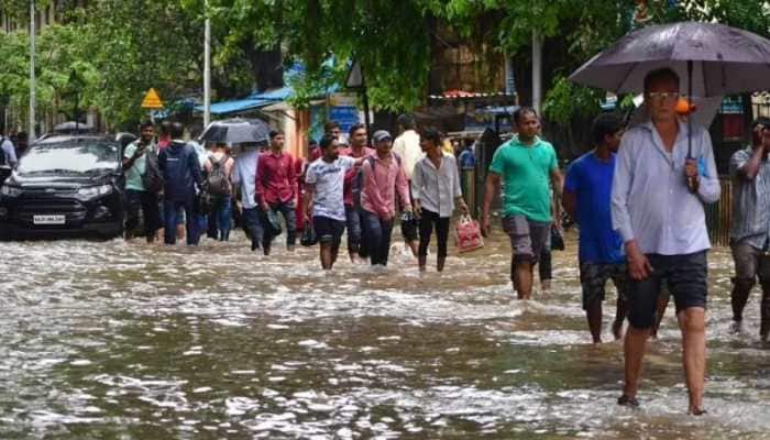 Mumbai rains: Overnight rainfall causes waterlogging in several parts of city, yellow alert issued - Check IMD&#039;s forecast