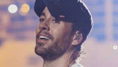 Singer Enrique Iglesias locks lips with fan on stage, video goes viral-Watch