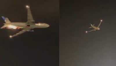 SCARY! United Airlines flight captured on camera emitting spark, makes emergency landing