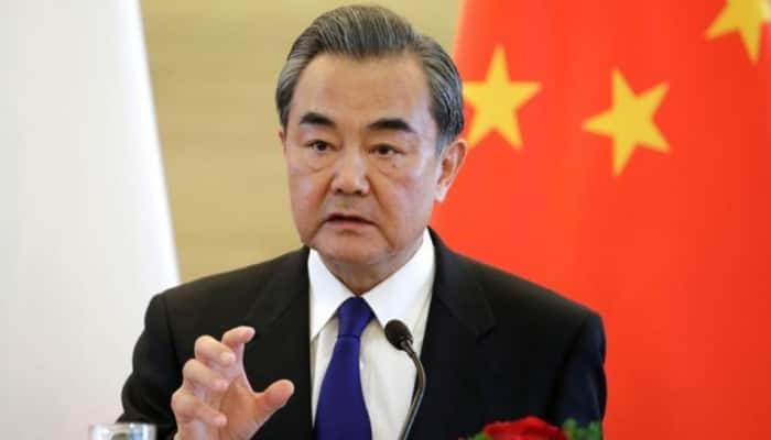 ‘Whoever intervenes in Taiwan reunification will be crushed by the wheels of history': China warns interlopers