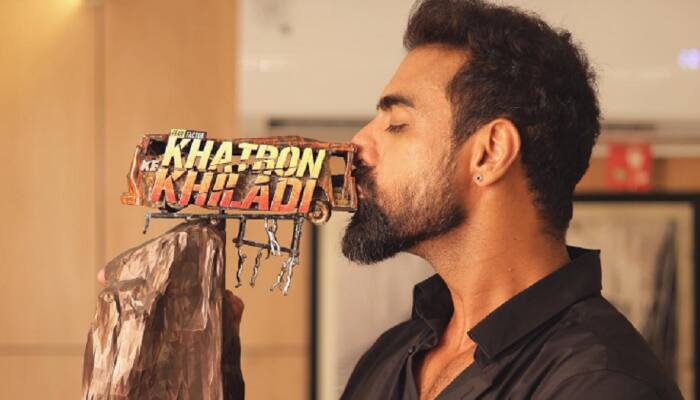 Tushar Kalia strikes a pose with &#039;Khatron Ke Khiladi 12&#039; winner trophy