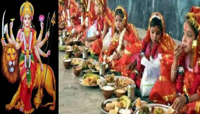 नवरात्रि पर DM ने कन्याओं के पैर धोकर कराया भोजन, गिफ्ट भी दिए - Navratri  kanya puja dm washed touch feet girls gifts ghazipur uttar pradesh lclar