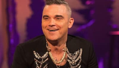 Robbie Williams says his documentary will be 'full of sex, drugs'