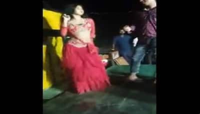 SHOCKING! Video of woman dancing with pistol at event in Bihar's Siwan city goes viral- WATCH 
