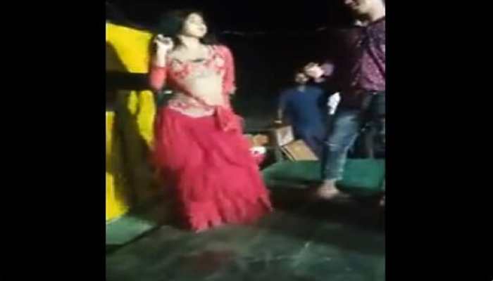 SHOCKING! Video of woman dancing with pistol at event in Bihar's Siwan city goes viral- WATCH 