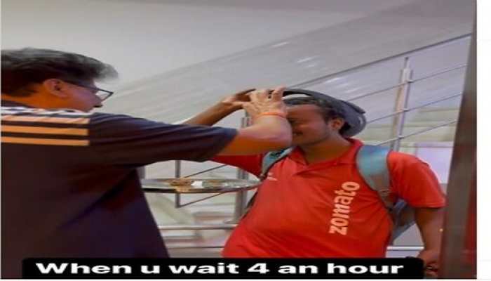 Viral Video: Zomato Delivery boy delivers food late, Delhi man welcomes him with 'AARTI KI THAALI'- WATCH