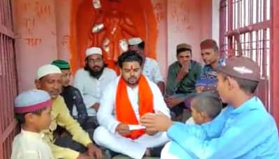 UP: Muslim youths chant Hanuman Chalisa along with Hindu man in Aligarh temple