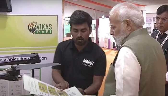 PM Modi visits Agri Startup Conclave and Exhibition pavilion; enquires about modern farming equipment