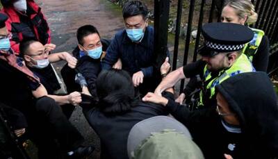 UK summons Chinese diplomat over assault on protester on China consulate grounds