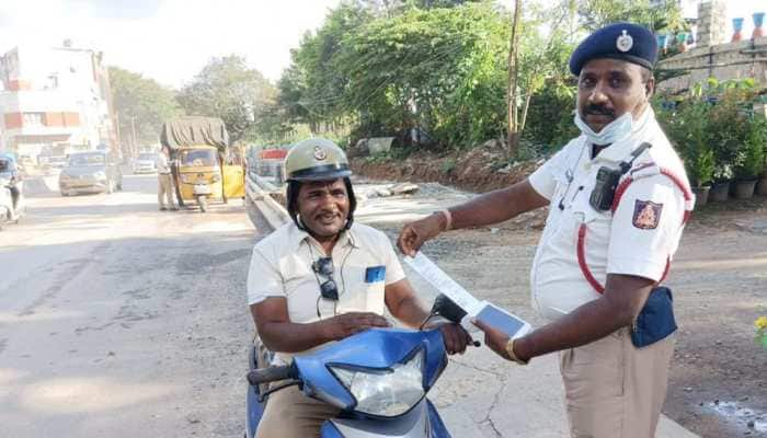 Bengaluru traffic cop fines another policeman for wearing wrong helmet, netizens say &#039;PR stunt&#039;