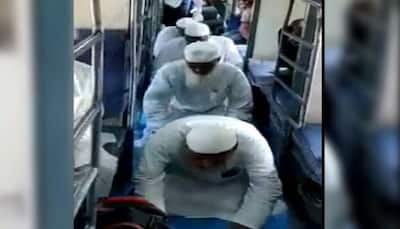 VIRAL video shows men offering Namaz inside train in UP, probe initiated