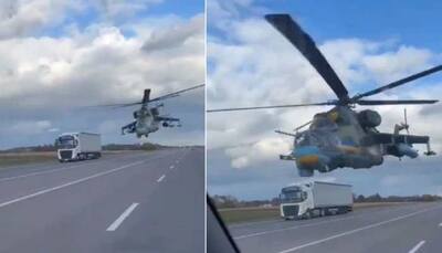 Military helicopter flies deadly close to traffic as Ukrainian Pilot shows his flying skills, Video goes VIRAL
