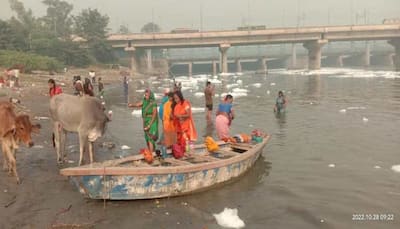 Chhath Puja 2022: Delhi Jal Board sprays chemicals in Yamuna to treat toxic foam