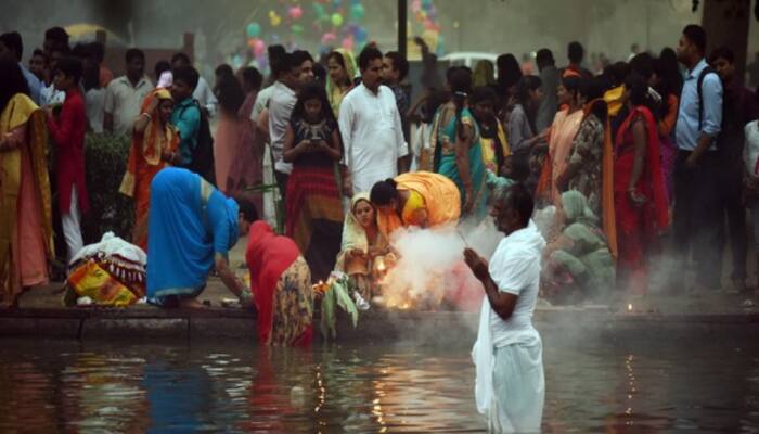 WATCH: Devotees gather in Kalindi Ghat in Delhi, offer prayers on Chhath Puja