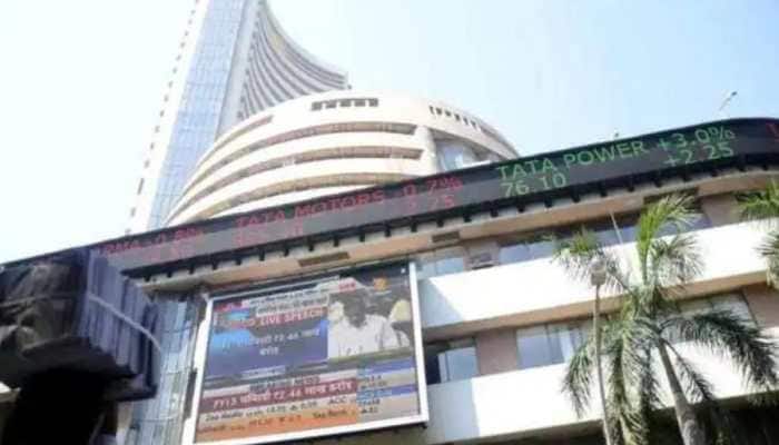Sensex, Nifty open in green on Friday, Rupee up by 31 paise against dollar