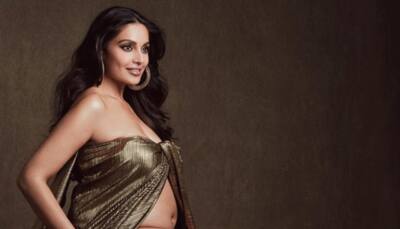 Bipasha Basu flaunts her baby bump in off-shoulder golden dress, check out her latest maternity photo