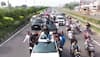 Actor turned Politician Pawan Kalyan arrives in village sitting on car roof, ignores all road SAFETY rules