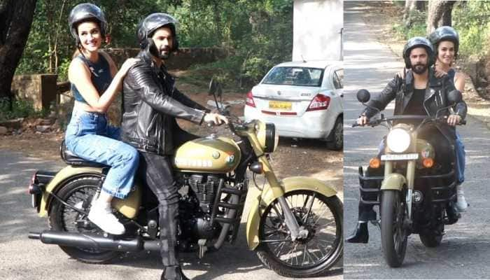 Actors Varun Dhawan, Kriti Sanon take a joy ride on Royal Enfield Classic 350 Signals to promote Bhediya