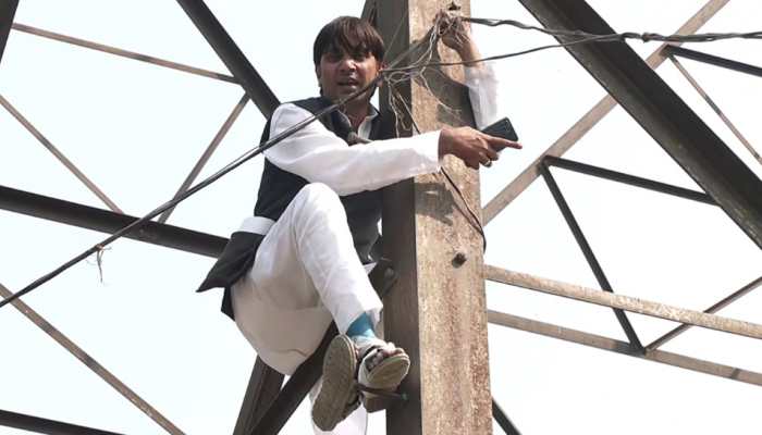 Former AAP councillor denied MCD poll ticket, climbs electricity tower in protest; claims it&#039;s being &#039;sold for Rs 2-3 cr&#039;