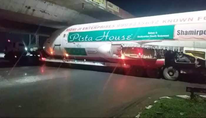 VIRAL! Plane transported on truck in Andhra Pradesh gets stuck under bridge: Watch Video