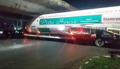 VIRAL! Plane transported on truck in Andhra Pradesh gets stuck under bridge: Watch Video