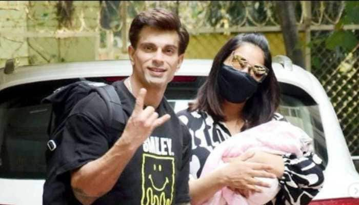 Bipasha Basu and Karan Singh Grover are all smiles as they bring daughter &#039;Devi&#039; home from the hospital-PIC