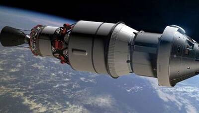 NASA Orion capsule buzzes moon, last big step before lunar orbit
