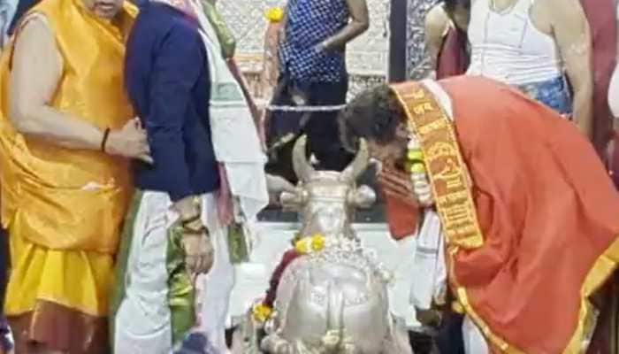 Ever seen Rahul Gandhi in Red Dhoti, offering puja? This video is for you!
