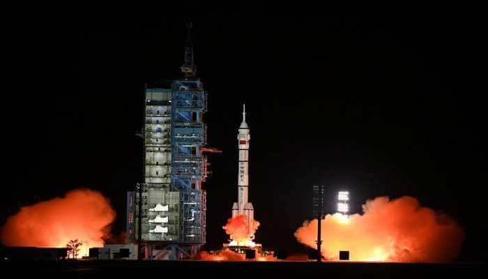 China successfully launches three astronauts for its under-construction space station 