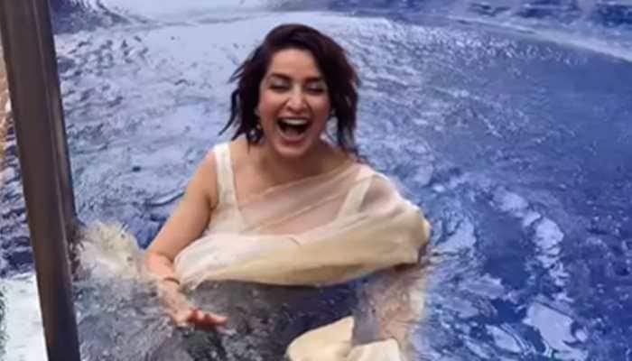 Saree-clad Tisca Chopra slips int pool looking sexy, fans call her HOT - Watch