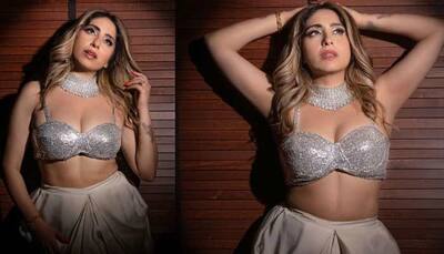 Neha Bhasin's enchanting video in a shimmering silver bralette and white dhoti pants is too HOT to handle - Watch