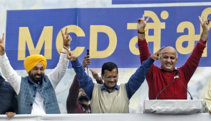 Arvind Kejriwal, Bhagwant Mann and Manish Sisodia celebrates win