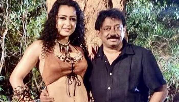 After licking and kissing video, Ram Gopal Varma poses with HOT south actress!