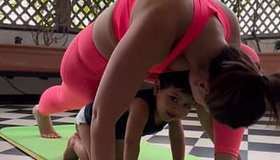 Kareena Kapoor does yoga in HOT neon pink racerback bustier and leggings, gets yoga-bombed by son Jeh Ali Khan in adorable video - Watch