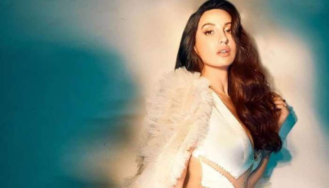 Nora Fatehi drops sexy photoshoot in iconic ivory deep cut dress ...