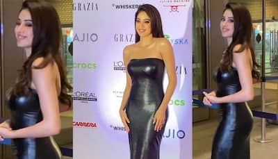 Janhvi Kapoor brings red carpet vibe to airport in black leather tube gown - Watch