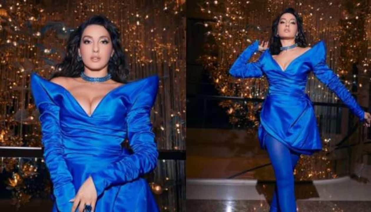 Jet-setting in style: Nora Fatehi rocks a chic blue outfit, black