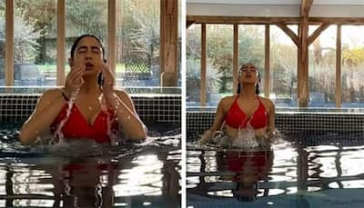 Sara Ali Khan enjoys her dip in the pool wearing red hot bikini, unwinds in UK with mom- Watch