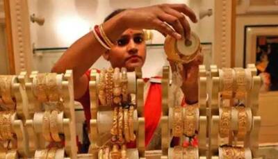 Gold gains Rs 59; silver declines Rs 194