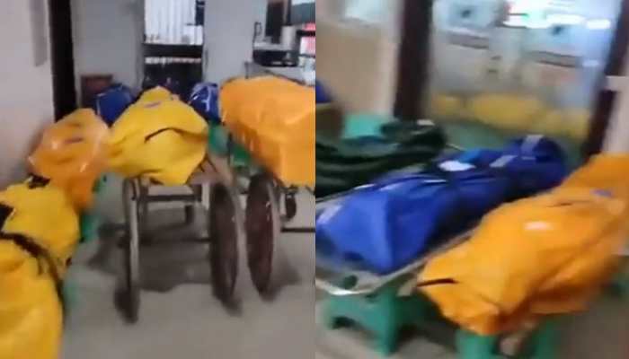 China&#039;s Covid crisis: Parking lot filled with makeshifts beds as hospitals overflow - Watch video