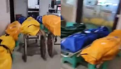 China's Covid crisis: Parking lot filled with makeshifts beds as hospitals overflow - Watch video