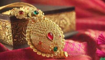 Gold rises Rs 205; silver declines Rs 30