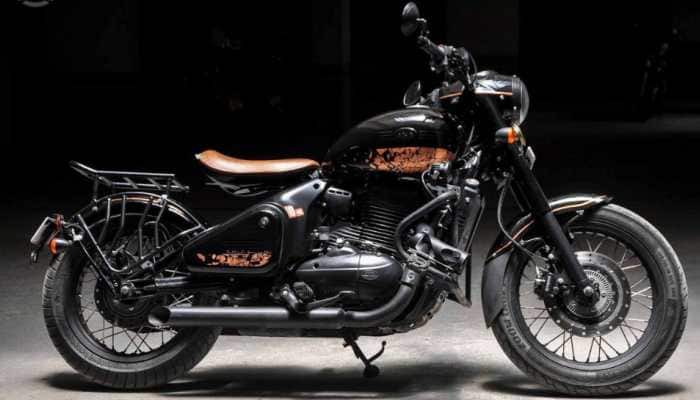 Modified Jawa Perak motorcycle with black bronze paint scheme has