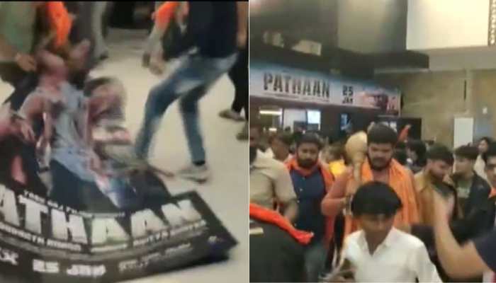 Bajrang Dal workers tear down Shah Rukh Khan&#039;s Pathaan movie posters in Ahmedabad: Watch