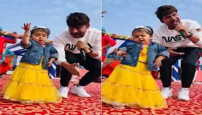 Viral Video: Little girl dances to Haryanvi song 'Kamar Teri Left Right Hale' with singer Ajay Hooda, netizens can't keep calm- WATCH