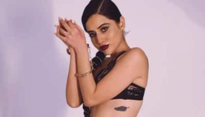 'Handcuffed' Urfi Javed shows off her sultry dance moves in a black monokini, hits back at haters - Watch
