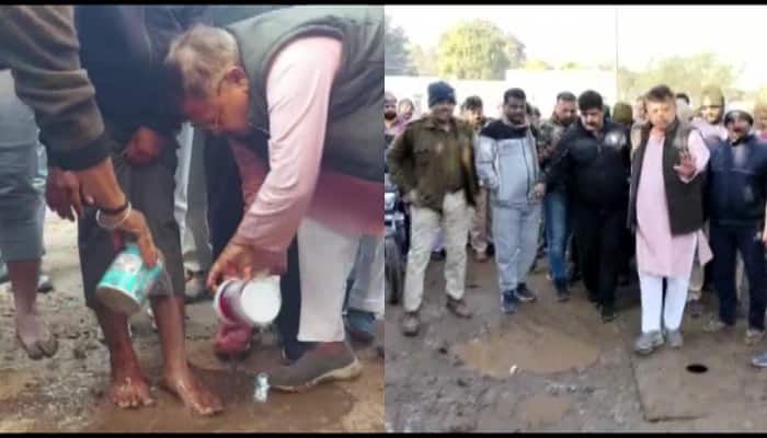 MP Minister washes feet of person to apologise for bad condition of road 