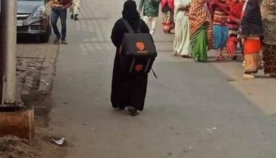 Here's full story of viral burqa-clad woman walking on the streets of Lucknow, carrying the Swiggy bag