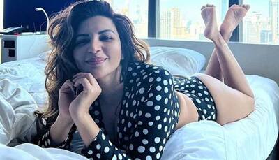 Shama Sikander wears a polka-dotted bikini set while 'lazying around' on bed, gets brutally bashed! 